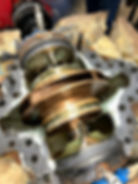 Centrifugal pump impeller and shaft during repair.