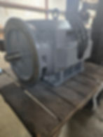 Industrial electric motor on pallet for repair services in Houston