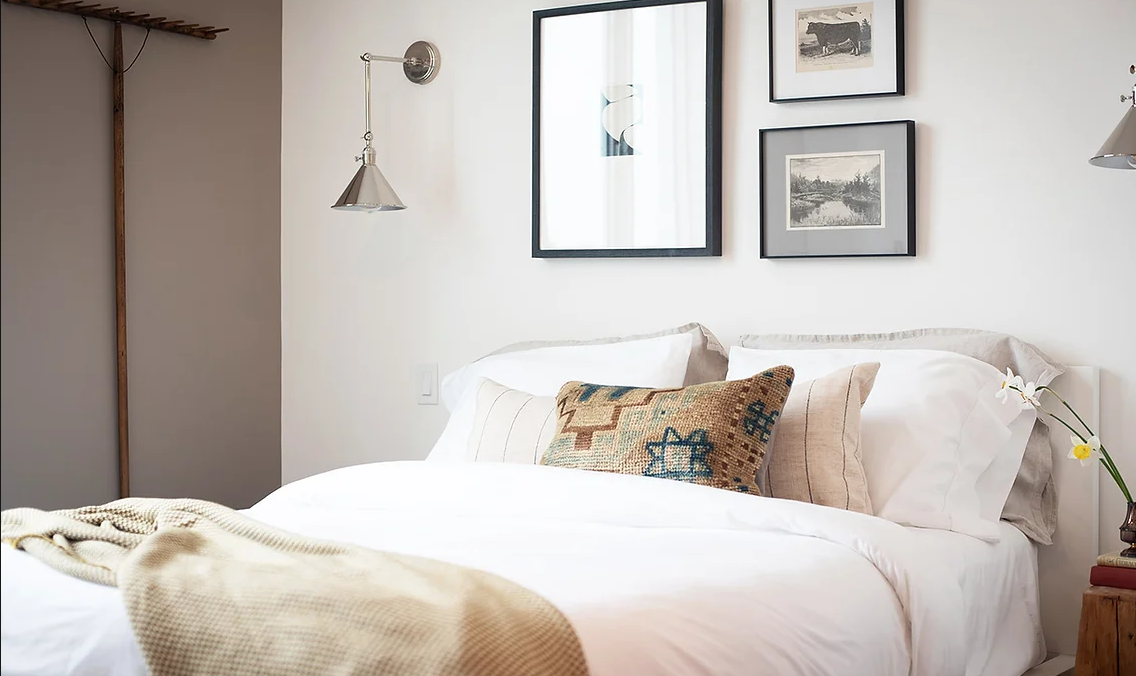 Cozy bed designed by Rebecca Meredith for 3 Sisters Hotel
