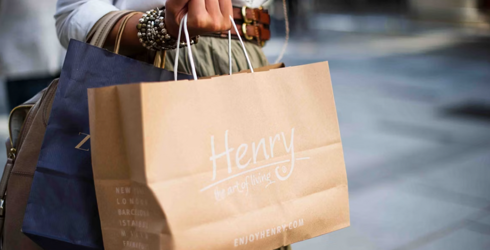 Shopping bags from a local boutique, representing Guatemala City's growing community of independent shops and designers.
