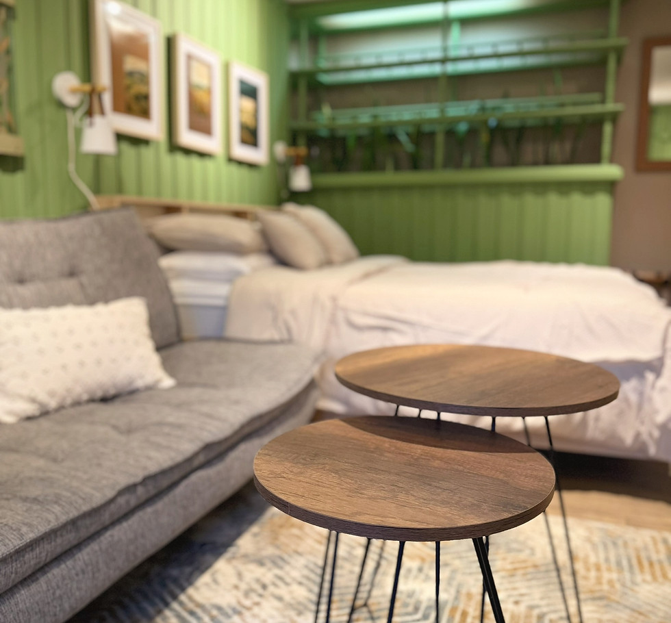 Cozy bedroom and living area at Studio 01, a thoughtfully designed stay offering comfort, simplicity and a welcoming atmosphere in Guatemala City.