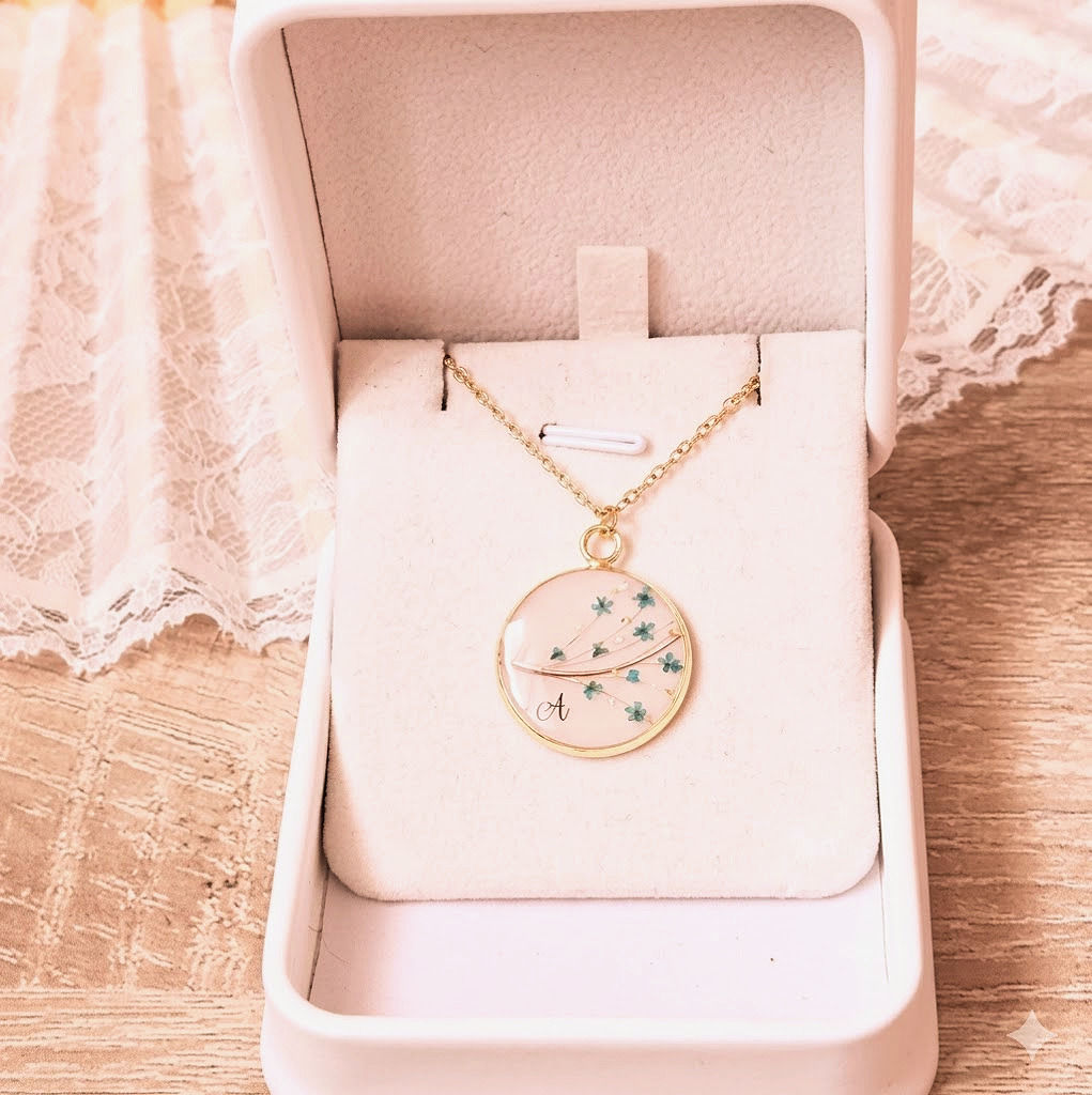 Collier avec mèche de cheveux bébé