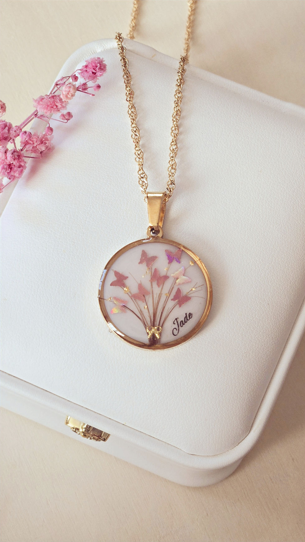 collier souvenir avec mèche de cheveux bébé