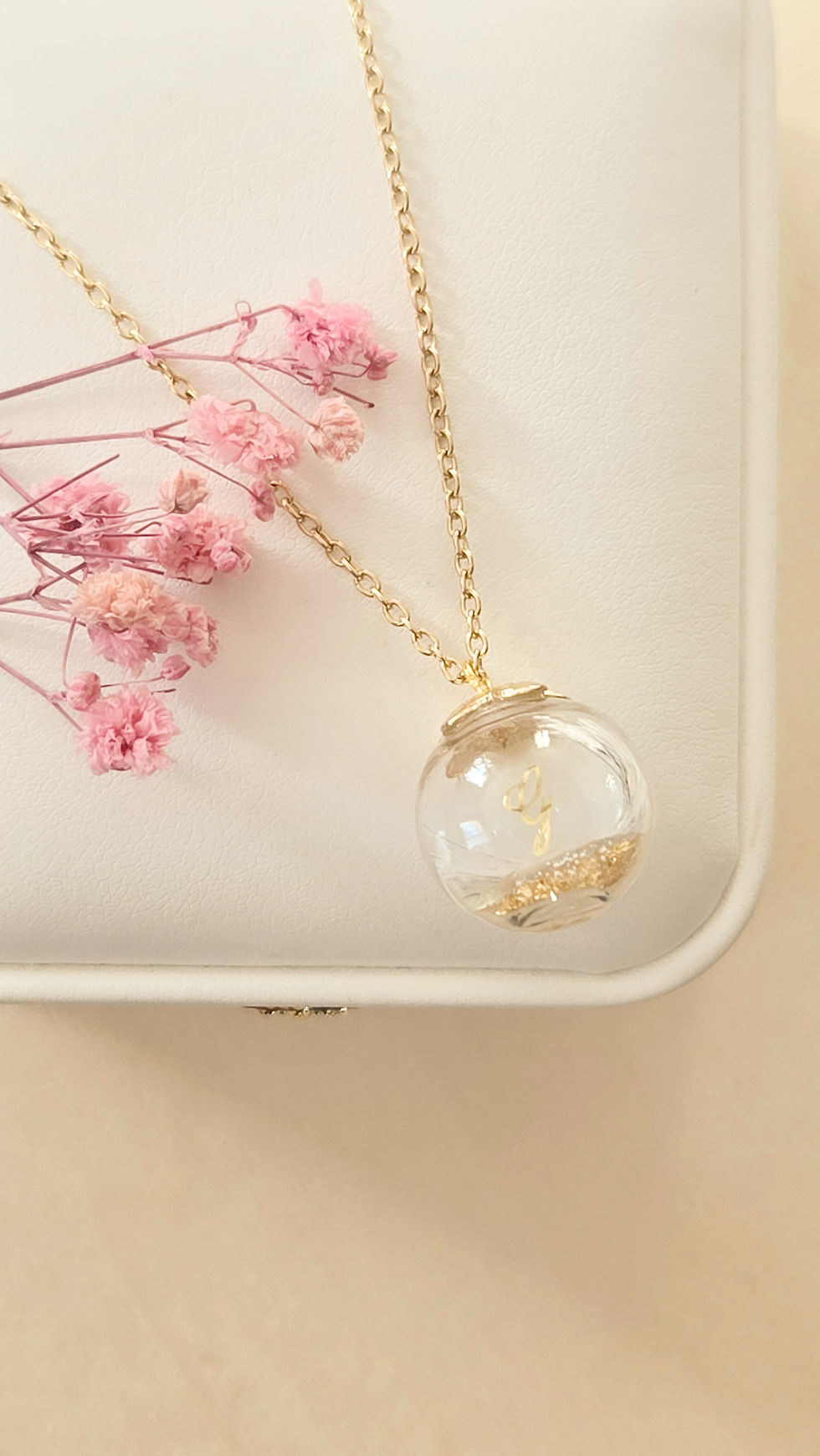 bijou souvenir personnalisé avec mèche de cheveux blanc