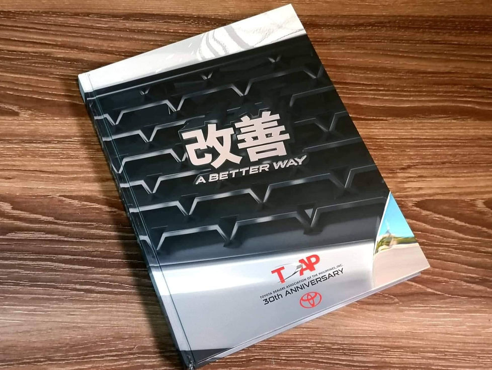 Toyota, TDAP, TDA, Toyota Dealers Association of the Philippines, Coffee Table Book, cover design, book layout, publisher, writer, photography, graphic design, car emblem, Kanji symbols, values, japanese, grills tribal, inside pages, history, publisher, writer, logo design