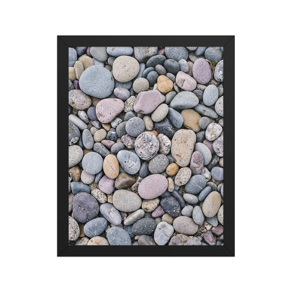 Framed multicolored beach pebbles overhead, natural texture wall art, Frameifi, smooth river pebbles in varied hues of lavender, slate, ochre, and dove grey.