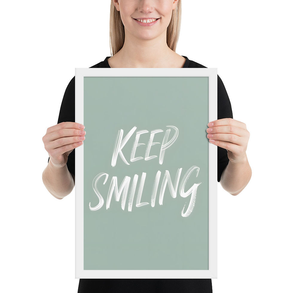 Thumbnail: Framed poster with "Keep Smiling" text in white on a sage green background, in a black matte frame, ideal for framed wall art decor.