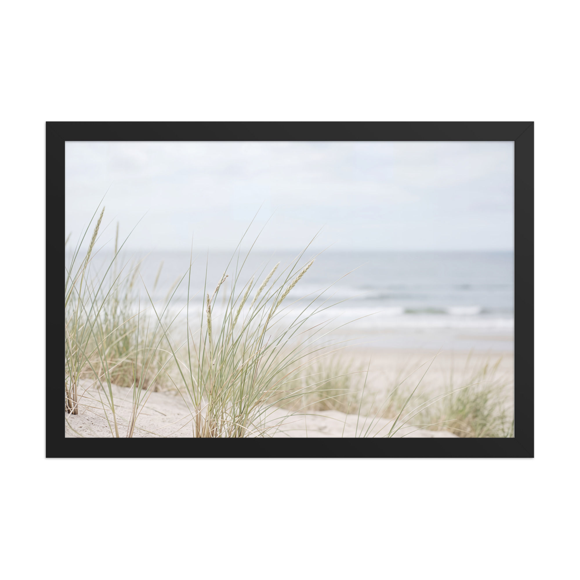 Framed wall art featuring serene coastal scene with dune grass and ocean view, in a black frame, perfect as framed poster and wall art.