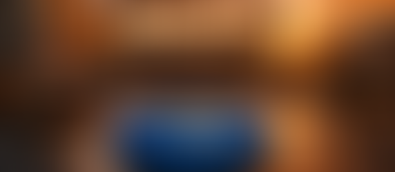 a crappy blow up pool on a roof top with sign reading luxury rooftop infinity pool and spa