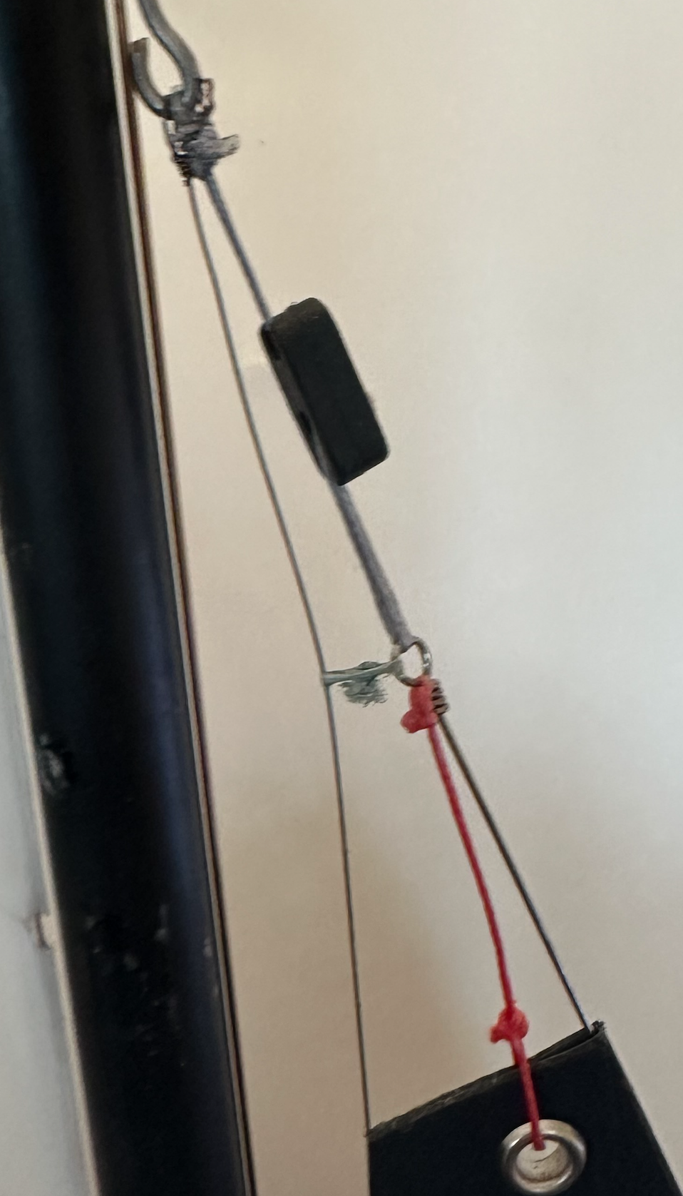 It is easier to hold the mast and pull the bowsie up and one can be more precise.