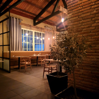 Portofino Italian Restaurant Bahia Ambar, brick wall with black beams on top