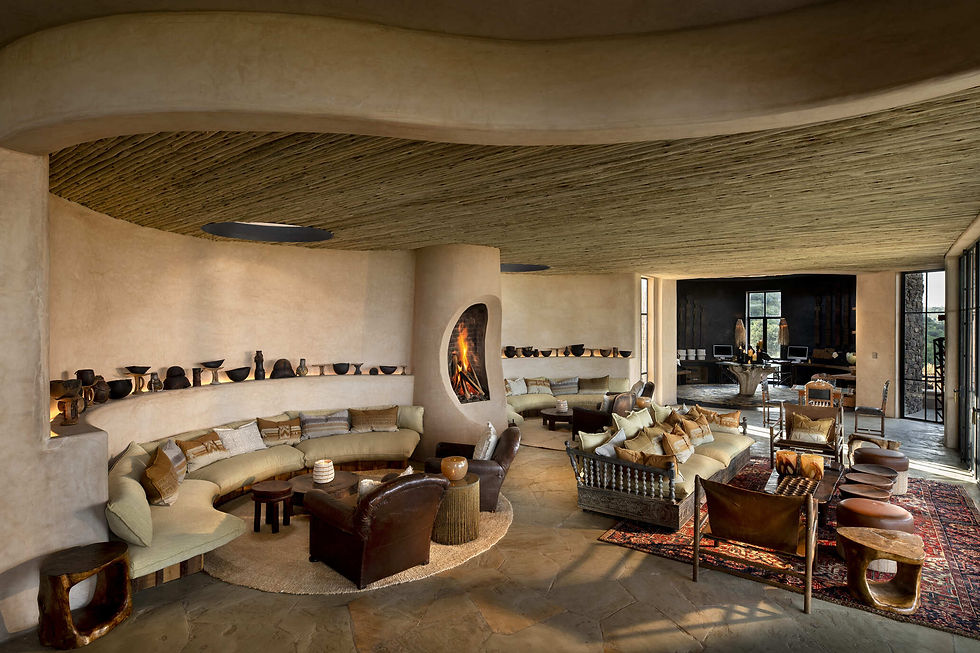 Aerial view of &Beyond Suyian Lodge nestled in Kenya’s Laikipia wilderness, surrounded by rocky outcrops and open savannah, with private plunge pools and panoramic views.