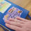 Thumbnail: Periwinkle sticker reading "Feeling Fancy" surrounded by illustrations of Milano cookies and other nostalgic snacks