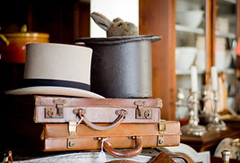 Antique briefcases and hats