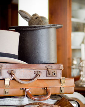 Antique briefcases and hats