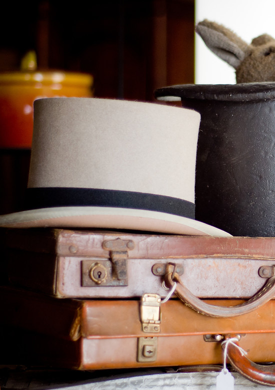 Antique briefcases and hats