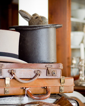 Antique briefcases and hats