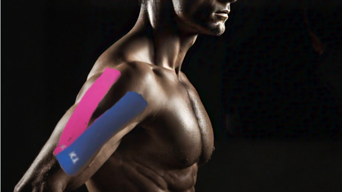 A muscular man with shoulder Instability taping applied to his upper arm and shoulder, featuring a pink and blue tape strip positioned to provide support and stability for shoulder function.