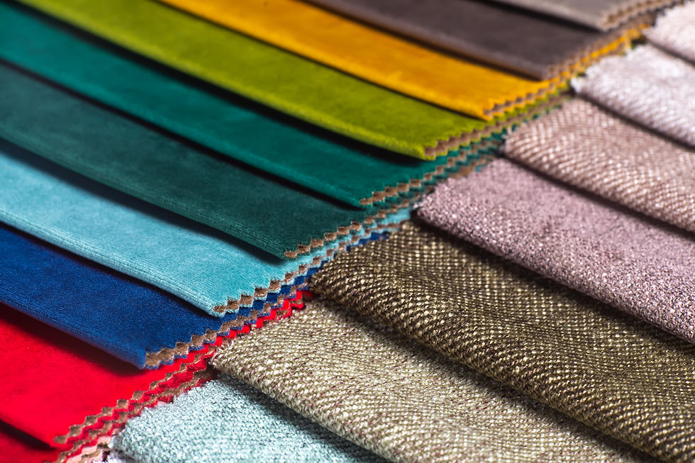 Multi-colored fabric swatches — ideal for fabric selection for small fashion brands looking to compare texture and color options.