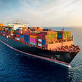 Fully laden cargo ship at sea