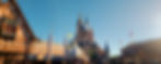 A building in front of Cinderella's Castle