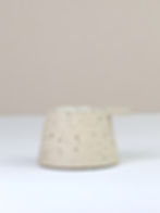 Ceramic tea light candle holder in a fleck stoneware clay and tab detail