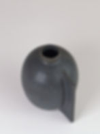 Handmade ceramic bud vase with 3d detail in a black glaze