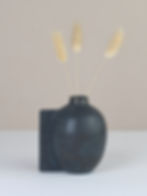 Handmade ceramic bud vase with 3d detail in a black glaze