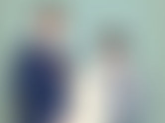 Japanese PM Sanae Takaichi, and Takayuki Kobayashi - LDP intelligence strategy chief hold an envelope of policy proposals.