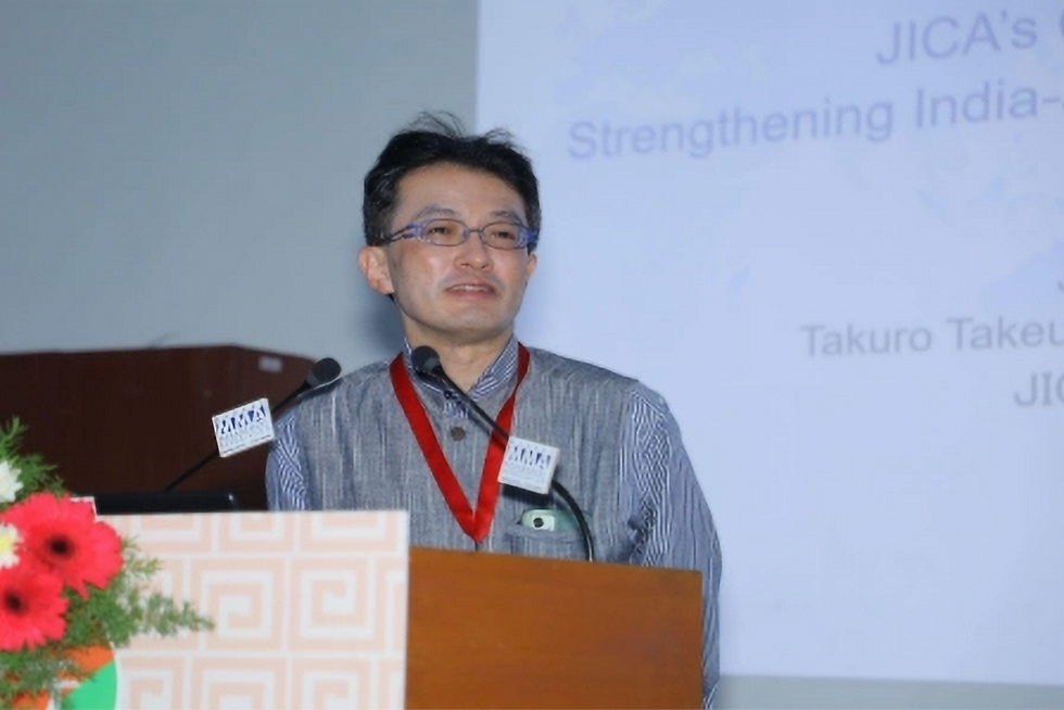 Takuro Takeuchi, Chief Representative of JICA India, speaking at the 4th India-Japan Business Conference in Chennai, highlighting JICA’s key areas of interest to deepen India–Japan business collaboration.