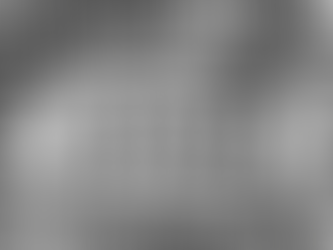 Torn paper reveals "ADHD" amid overlapping text like "HYPERACTIVITY" and "ATTENTION DEFICIT" in black and white, creating a chaotic effect.