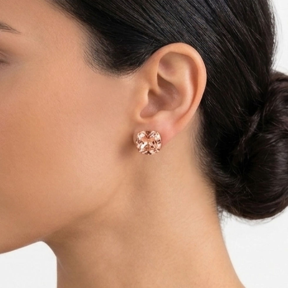 Stud earrings with peach pink crystal and gold-plated metal, hypoallergenic and nickel-free model.