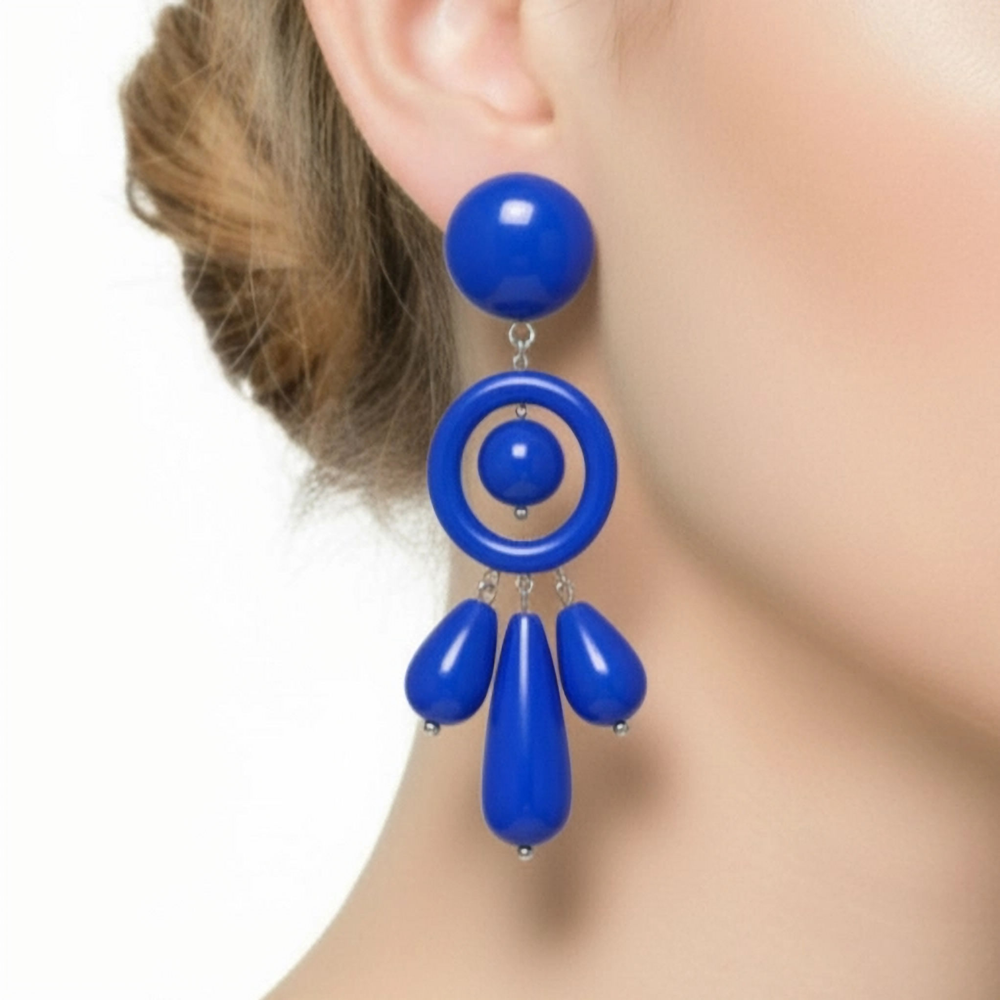 Large drop earrings, in shiny blue resin, with pin and butterfly closure.