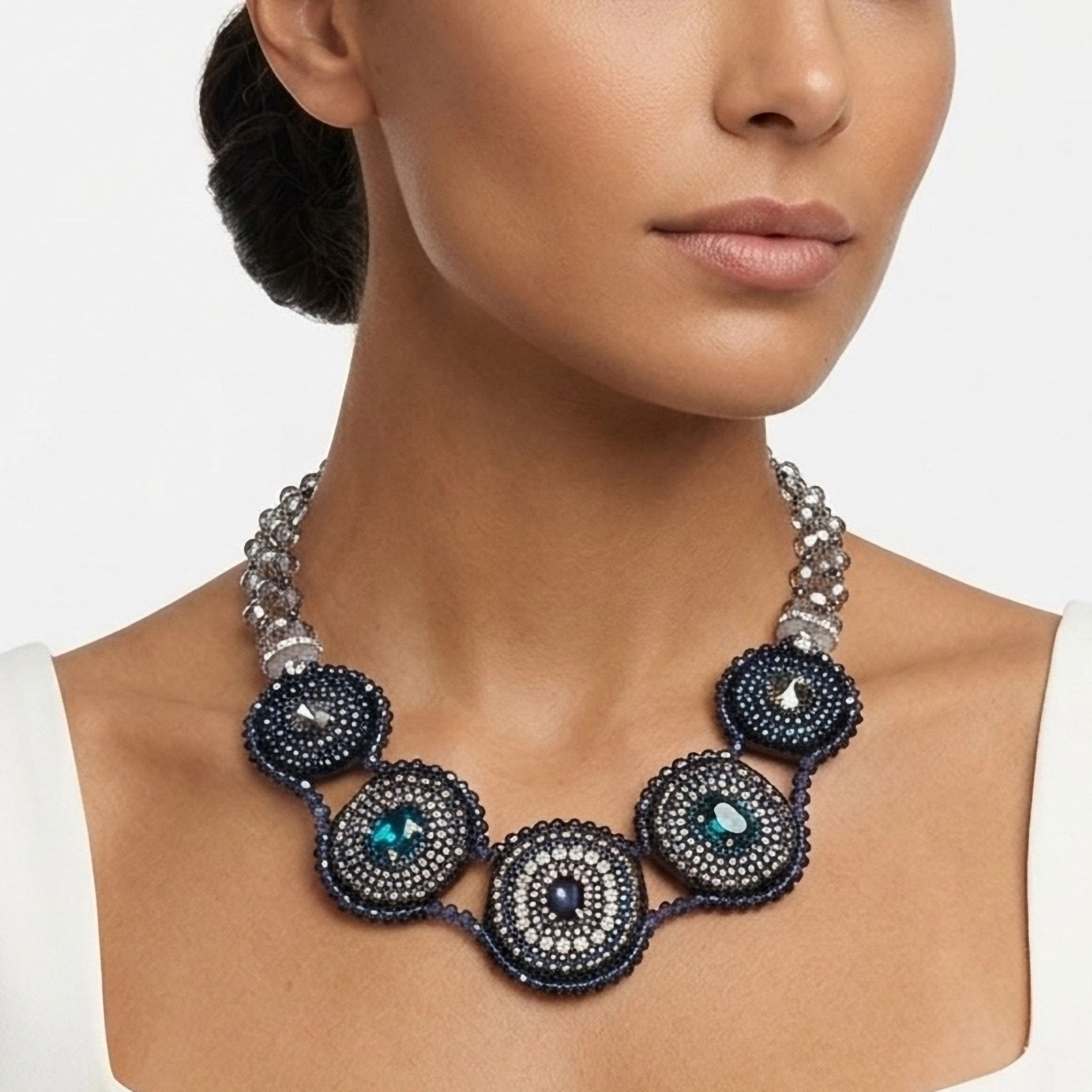 Elegant handcrafted statement choker necklace featuring a double row of crystals sapphire-blue and embroidered medallions.