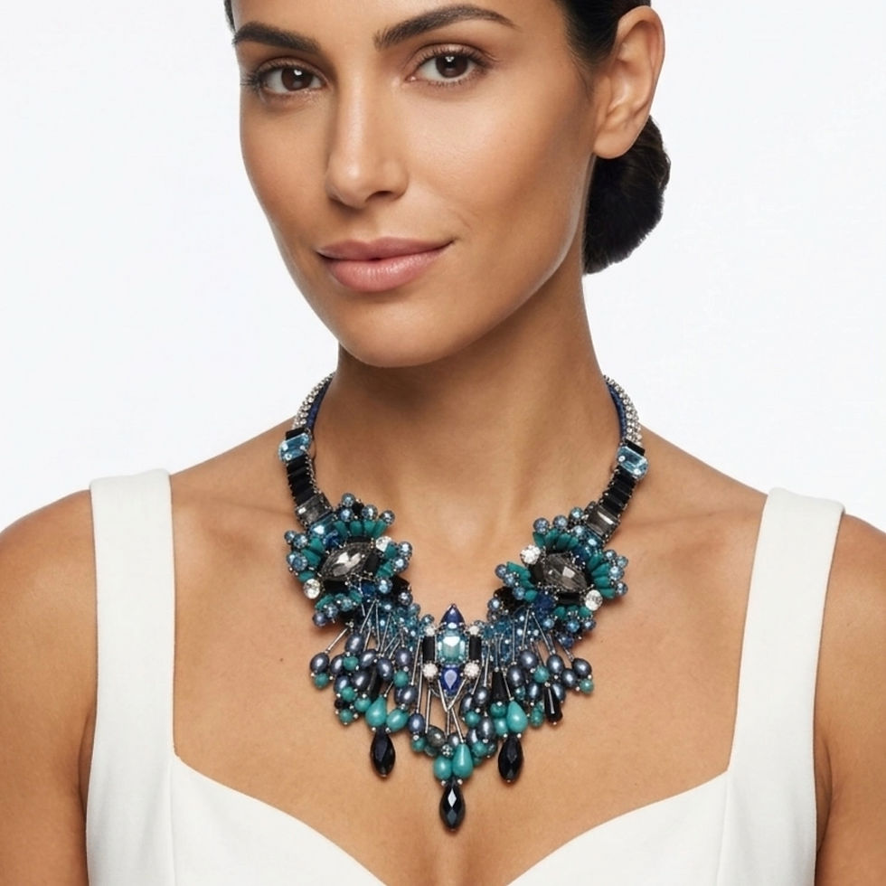 Elegant handcrafted bib-style choker necklace featuring blue crystals, turquoise, and pearls.