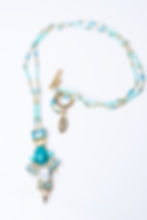Long blue or grey necklace with Swarovski crystals hand embroidered pendant.
