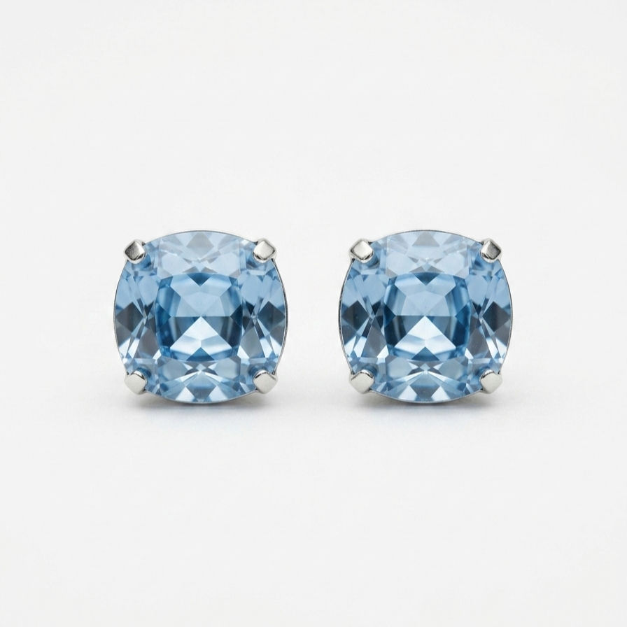 Hypoallergenic and nickel-free silver-plated stud earrings with aquamarine crystal.