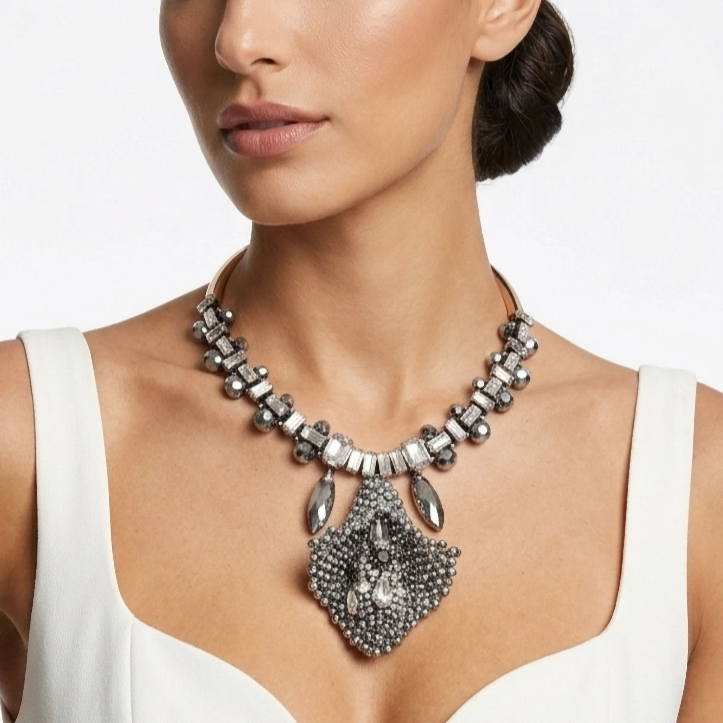 Silver statement necklace with large crystal calla lily pendant and rigid choker.