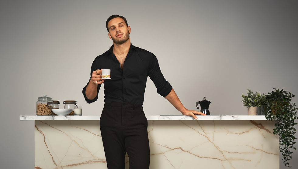 Vito with a cup of coffee for 2026 calendar cover_edited.jpg
