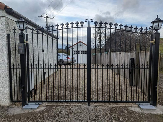 Underground swing wrought iron gates by CM Gates in Scotland