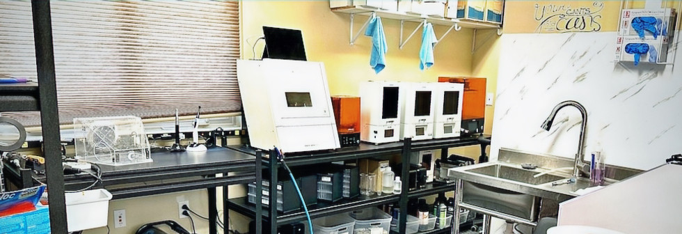 Modern laboratory setup with equipment and sink, ready for scientific research.