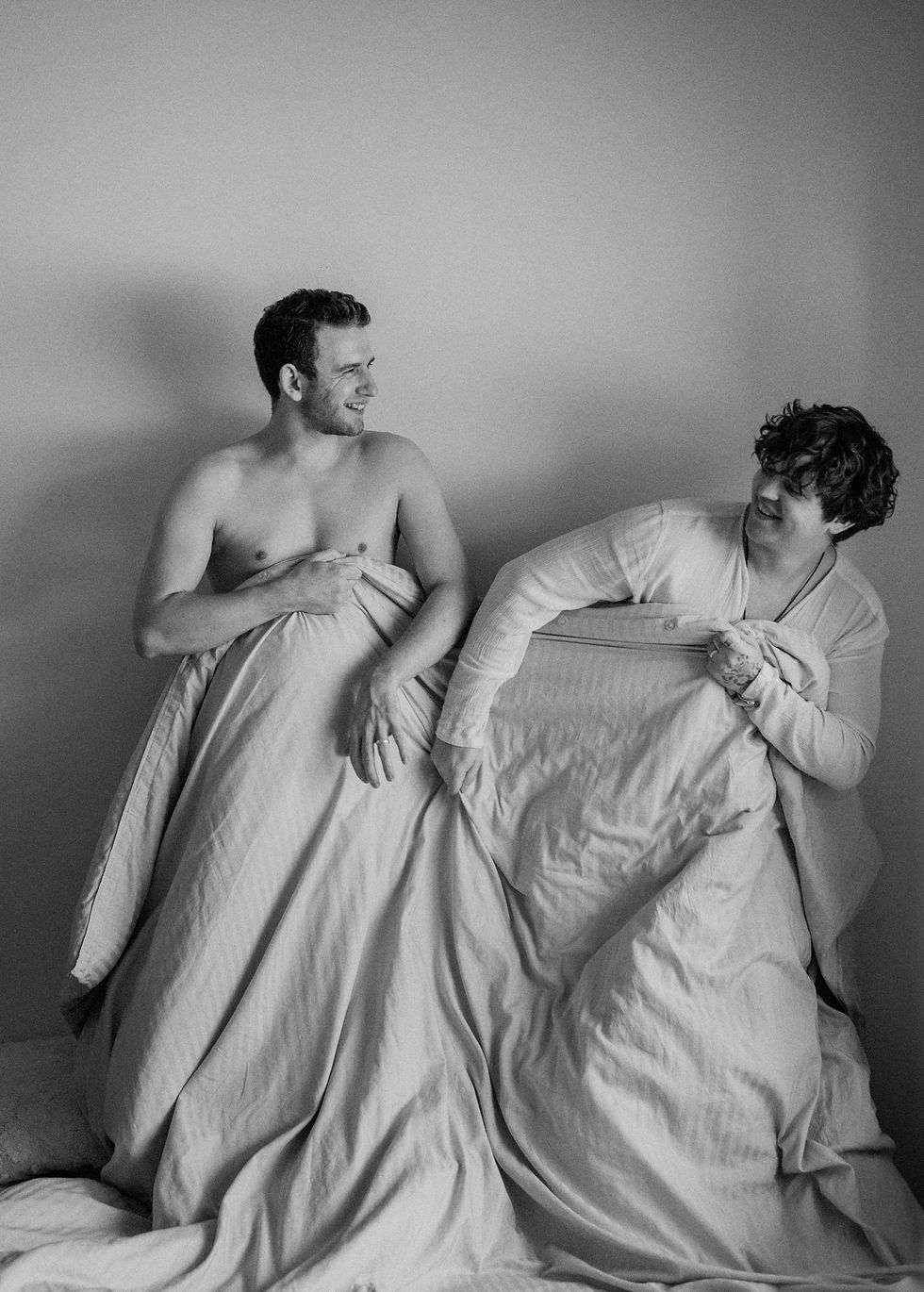 a hbtq couple, gay couple having fun, in-home photo session