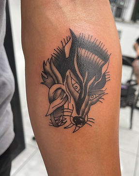 taj's wolf tattoo