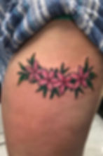 Full color stylized plumeria lei tattoo by Ian Whitten | Waikiki Hawaii