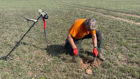detectorist digging for a target