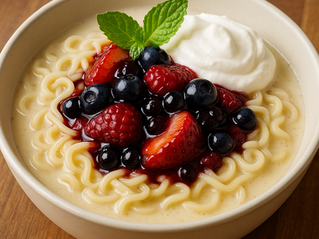 A Berry & Balsamic Dessert Ramen combines tender ramen noodles with a sweet vanilla-coconut “broth” and a vibrant berry ramen topping.