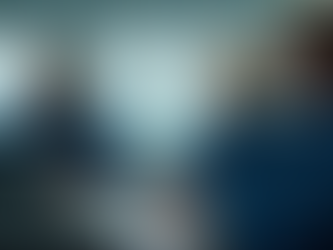 Engineers performing system diagnostics on a marine control unit during vessel performance analysis.