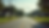 Eye-level view of a quiet suburban street in Mississippi with affordable homes