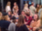 People at restaurant bar playing trivia