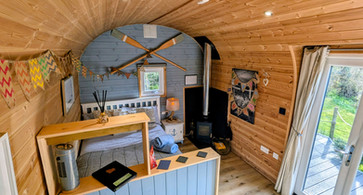 A glamping pod interior at Emlyn's Coppice in Flintshire, North Wales